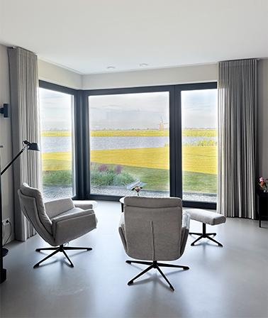 Vrijstaande nieuwbouwwoning Leeuwarden vrij uitzicht vaarwater Friesland platteland molen weiland landerijen